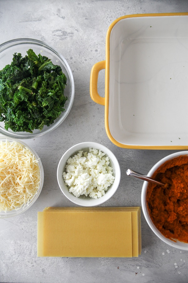 cooked and prepped ingredients for kale lasagna ready to assemble