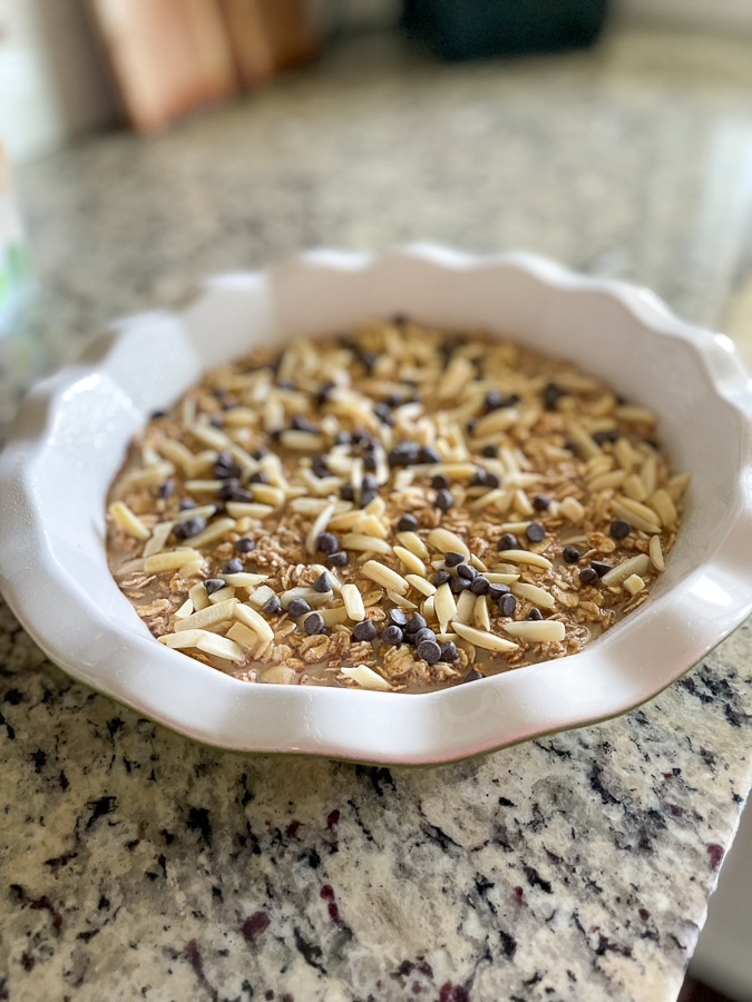 almonds and chocolate chips topping Top with almonds and chocolate chips