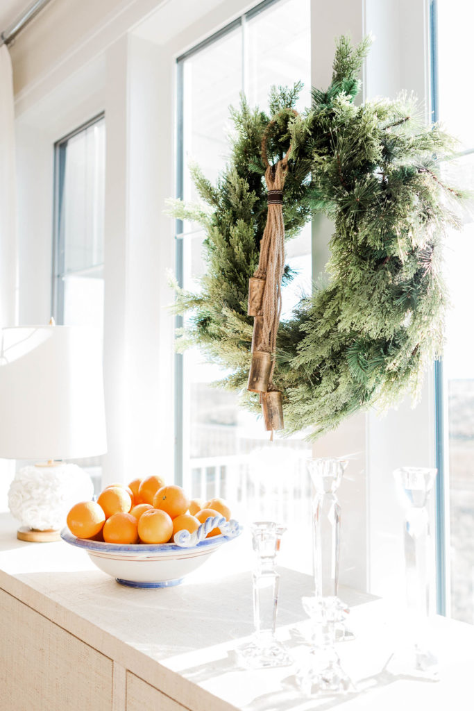 wreath with bowl of oranges | Ways To Stay Healthy This Holiday Season