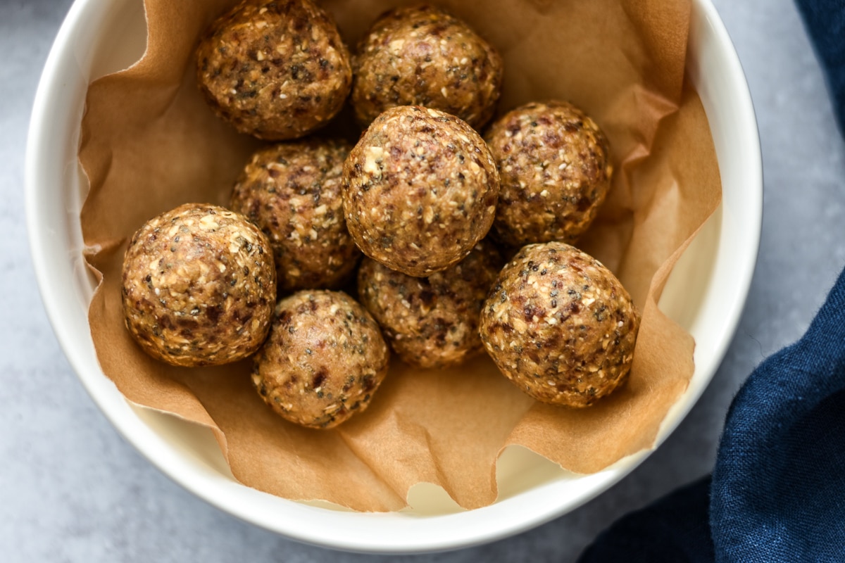 A dozen cookie dough bites in brown paper