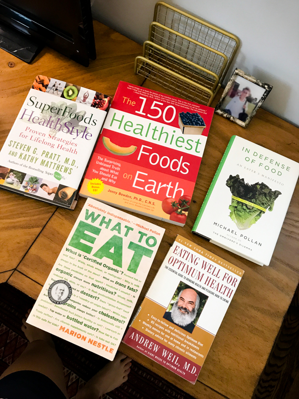 my 5 favorite nutrition books on a desk