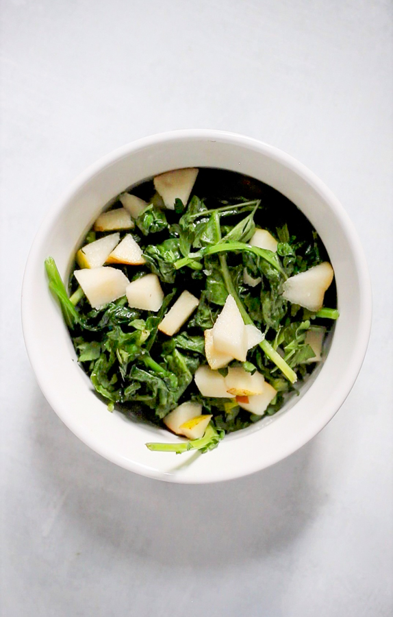 greens and pear in a ramekin