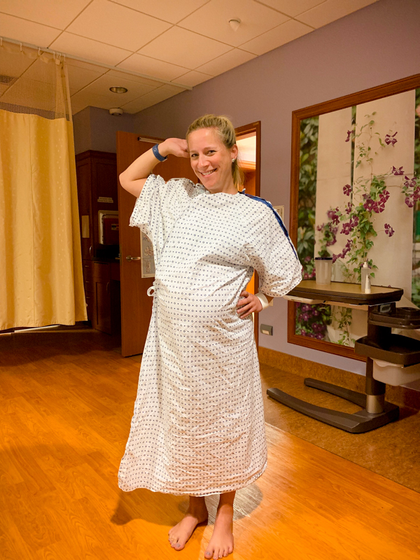 posing in my hospital gown for my birth story