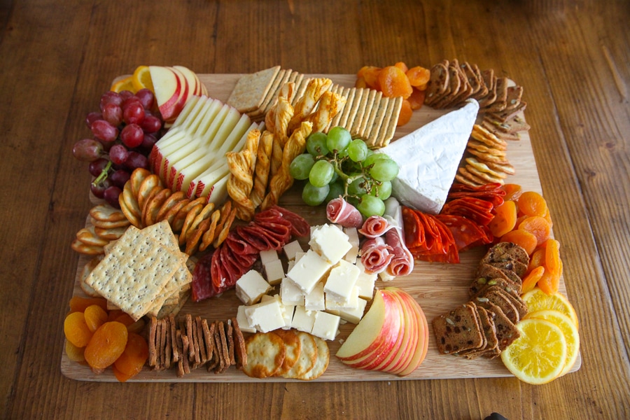 Thanksgiving Charcuterie Board - add in layers of crackers