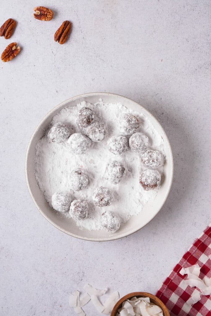 bourbon balls rolled in powdered sugar