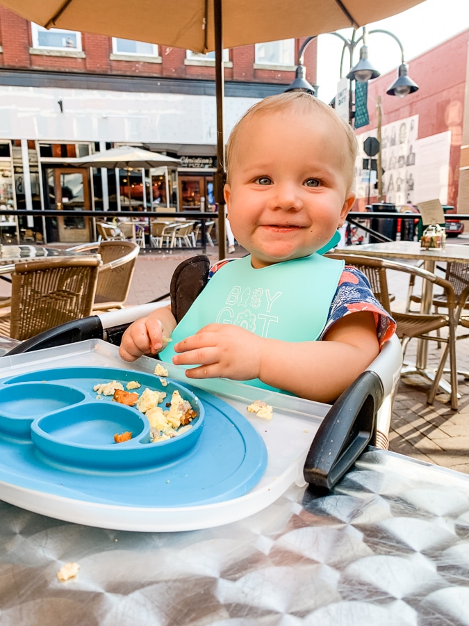 baby in a restaurant with ezpz plate