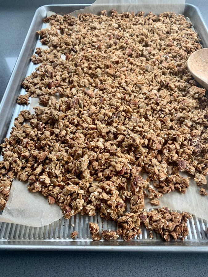Full stainless steel sheet pan of Crunchy Tahini Granola.