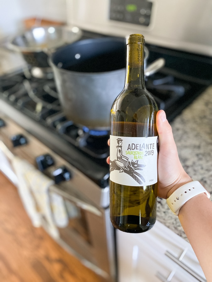 Scout and Cellar wine with a pasta pot on the stove