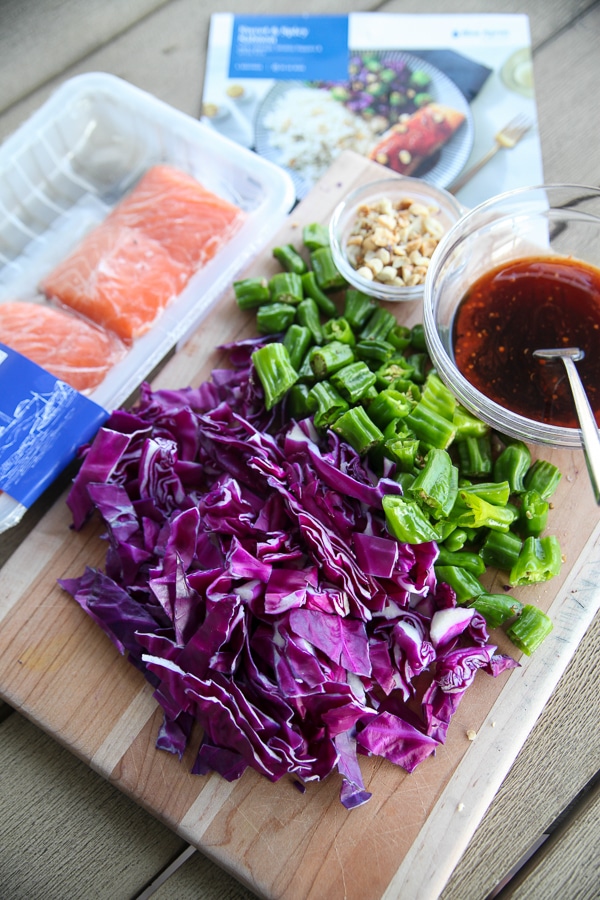 blue apron ingredients on a wooden board