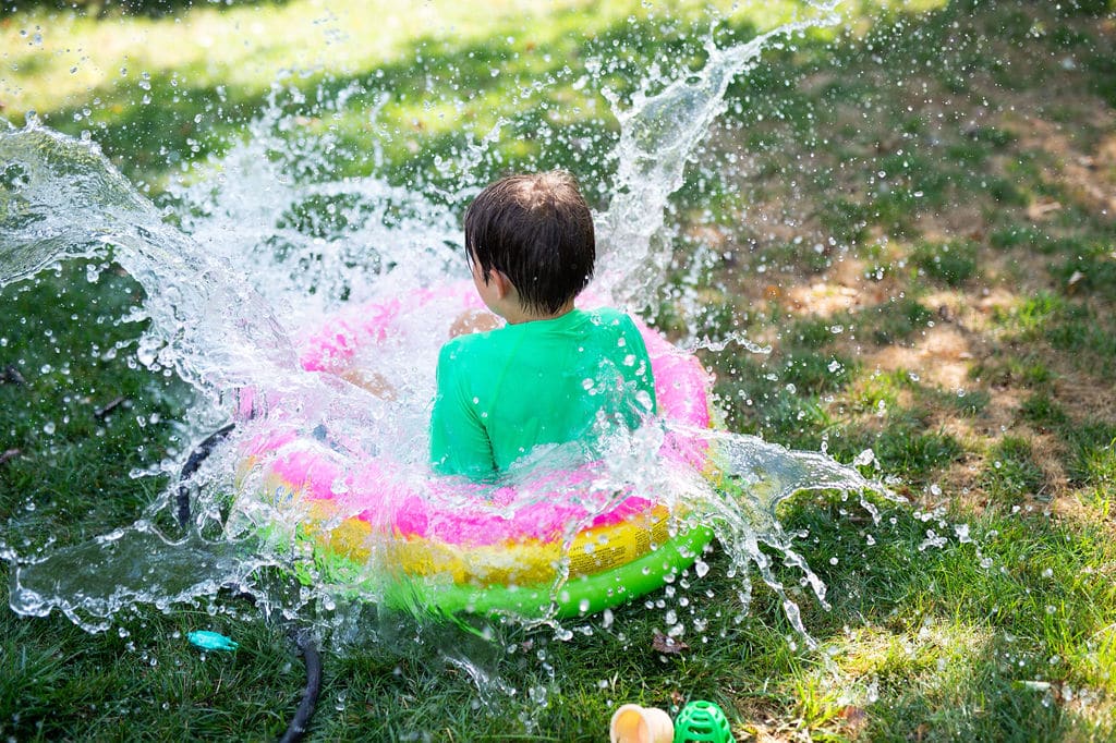 Mazen splashing in a pool
