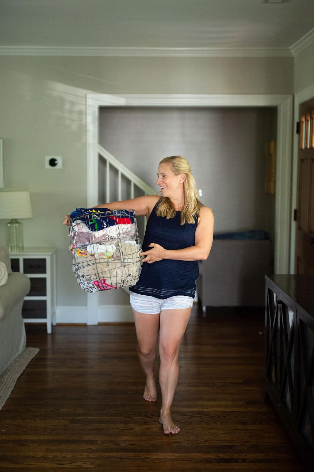 woman holding basket of laundry woman holding basket of laundry | woman holding basket of laundry