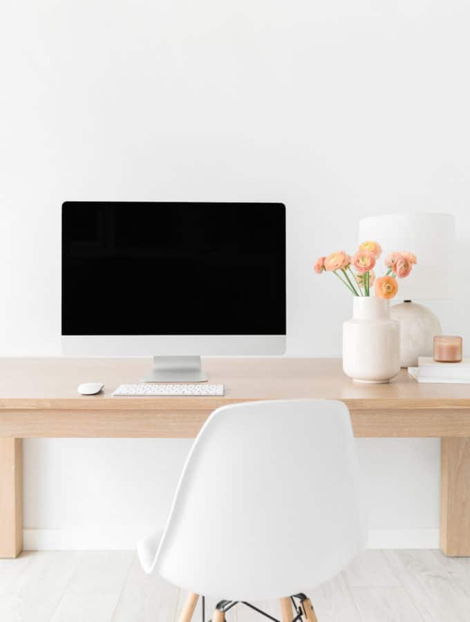 neat desk with flowers