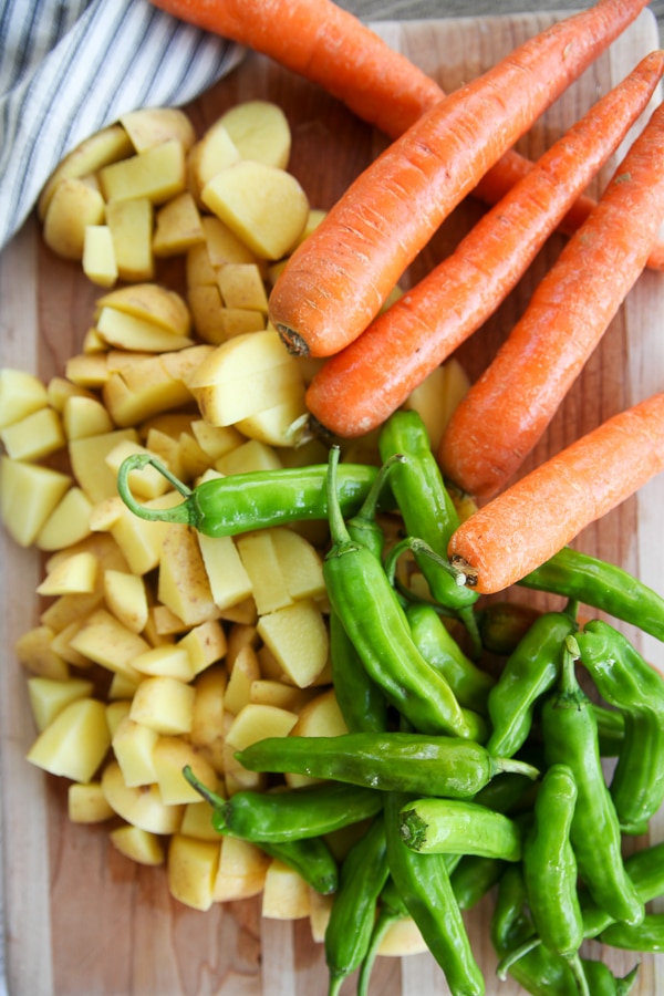 chopped vegetables on wood cutting board