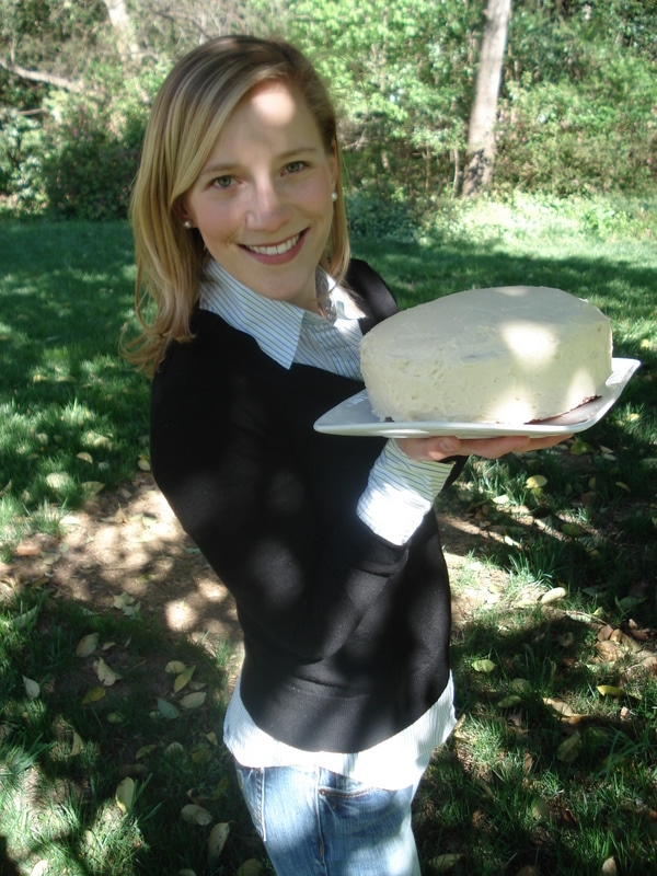 Kath Younger from 2007 holding a cake