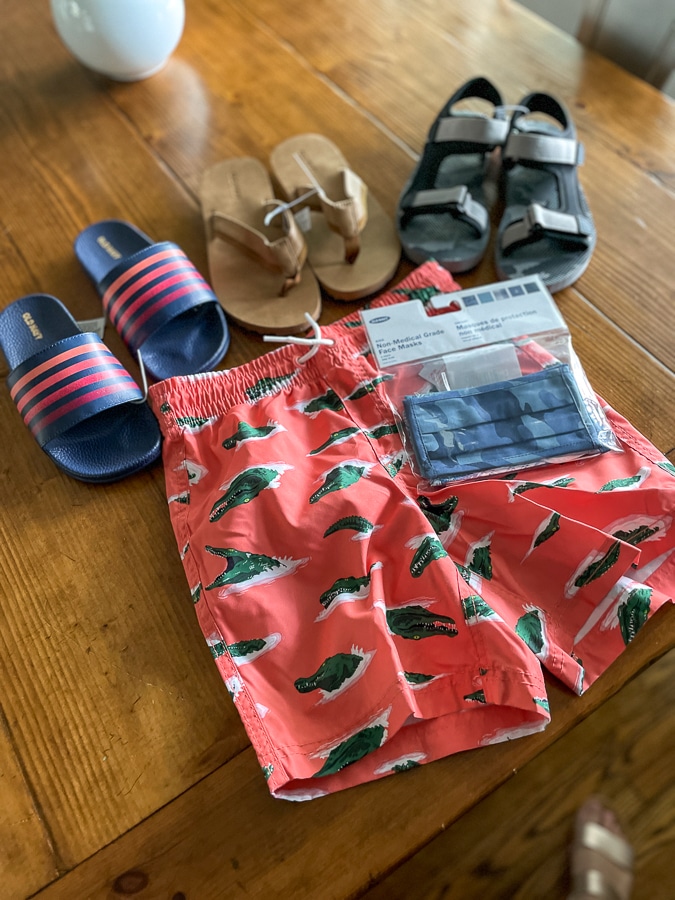 kids shoes and swim trunks
