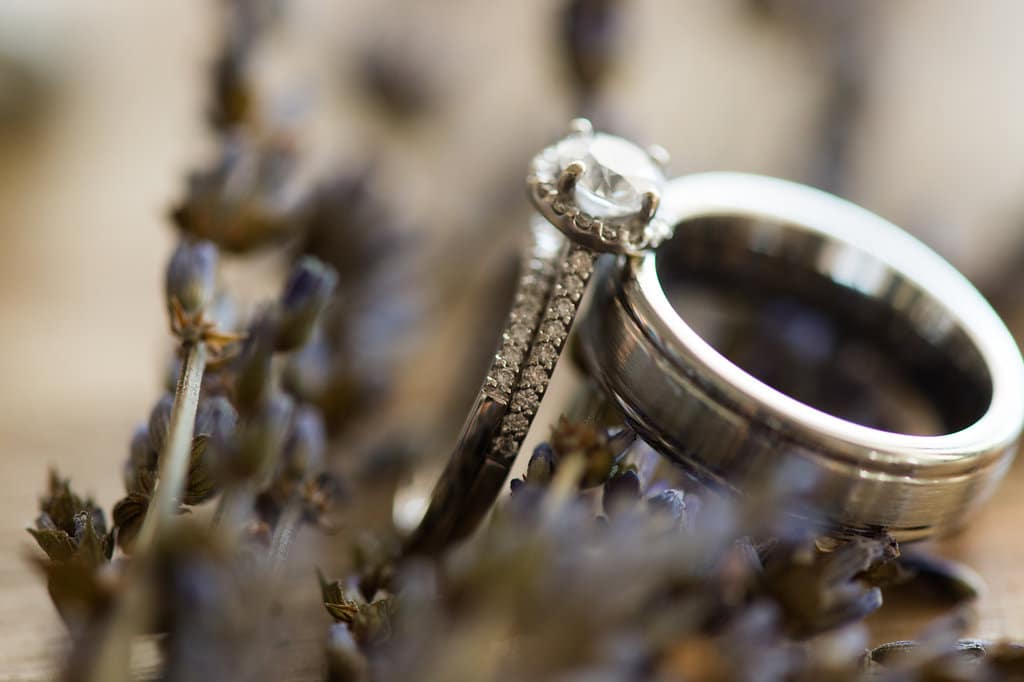 two wedding rings on lavendar