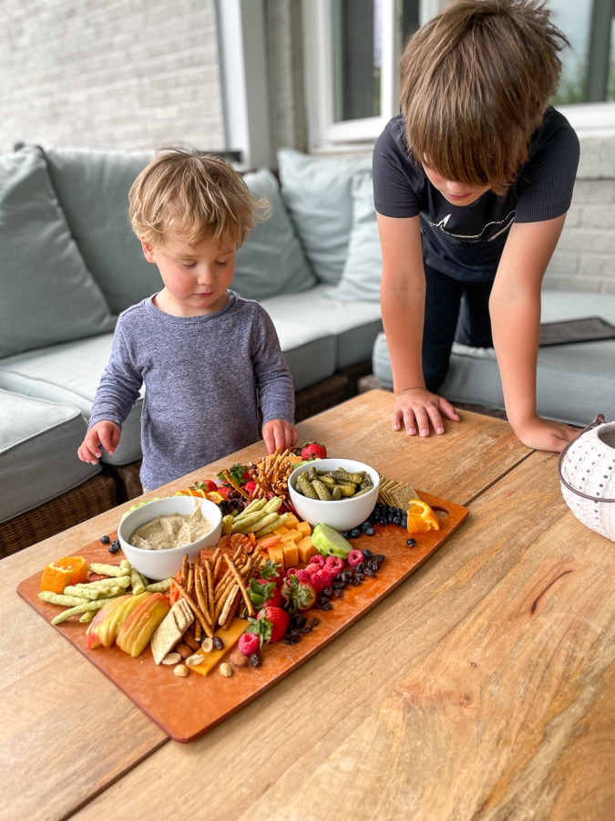 two boys enjoying Kids Charcuterie Board