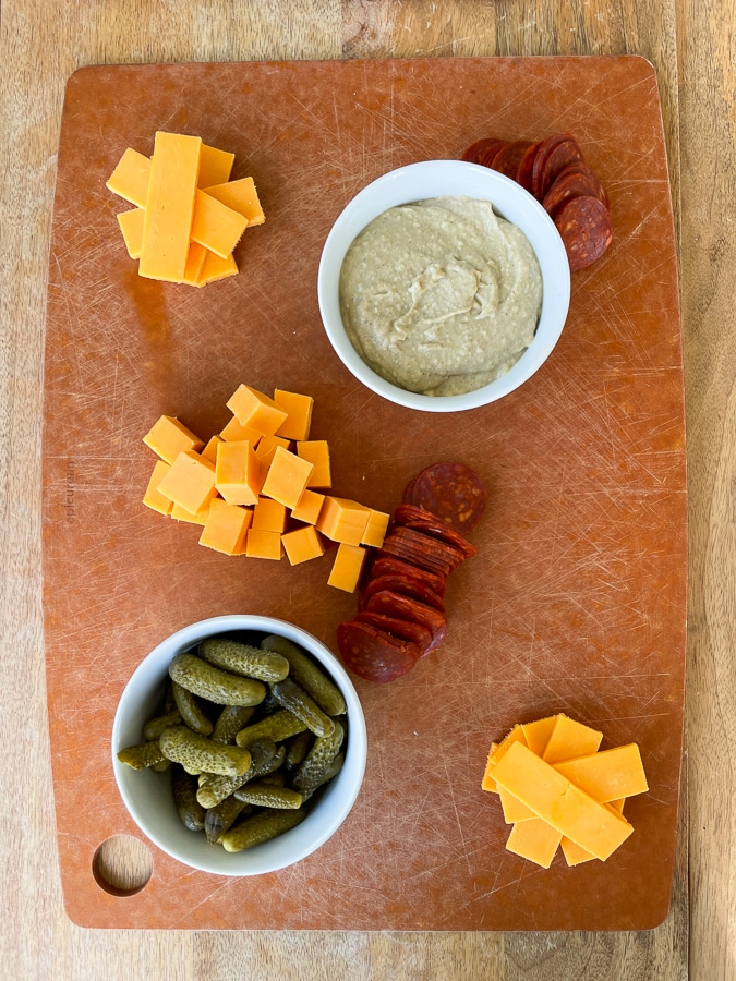 Kids Charcuterie Board with bowls, cheese, and pepperoni