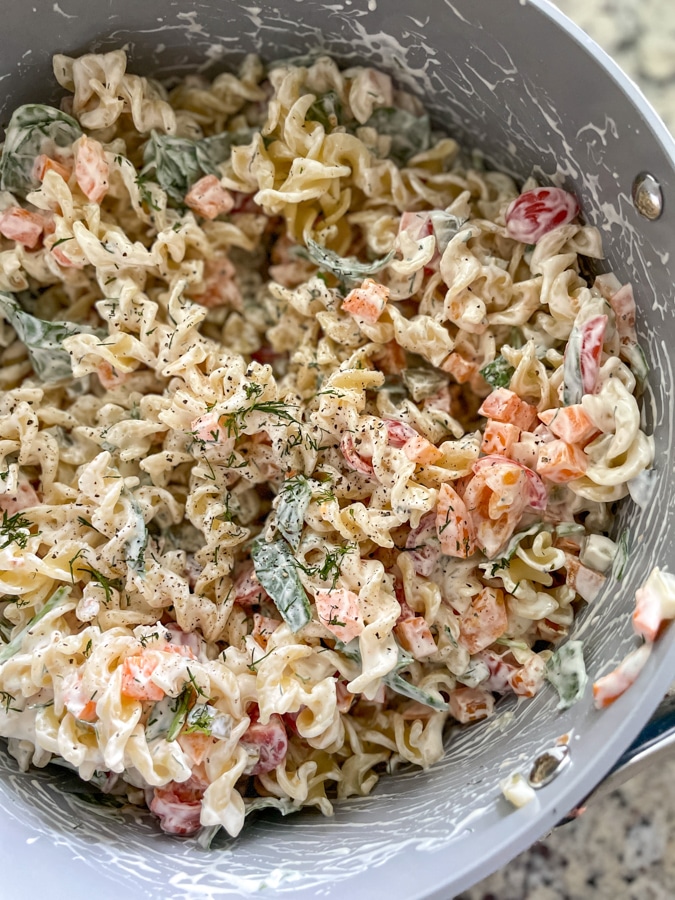 Season Dill Pickle Pasta Salad with salt and pepper Season Dill Pickle Pasta Salad with salt and pepper