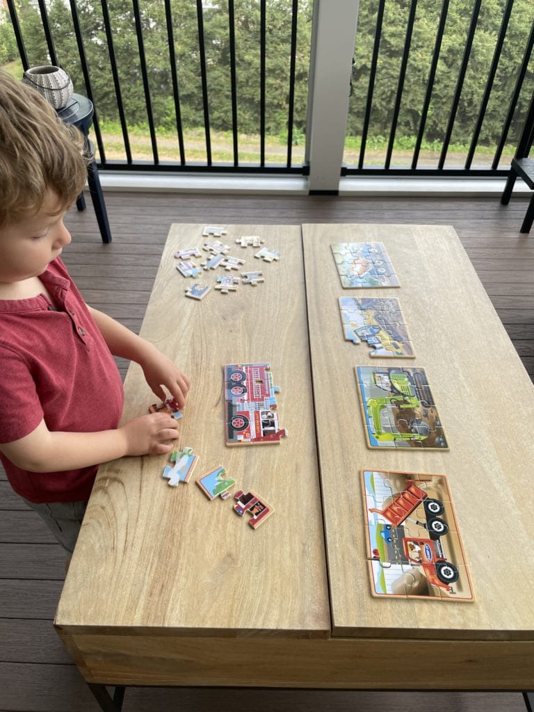 little boy playing puzzles little boy playing puzzles