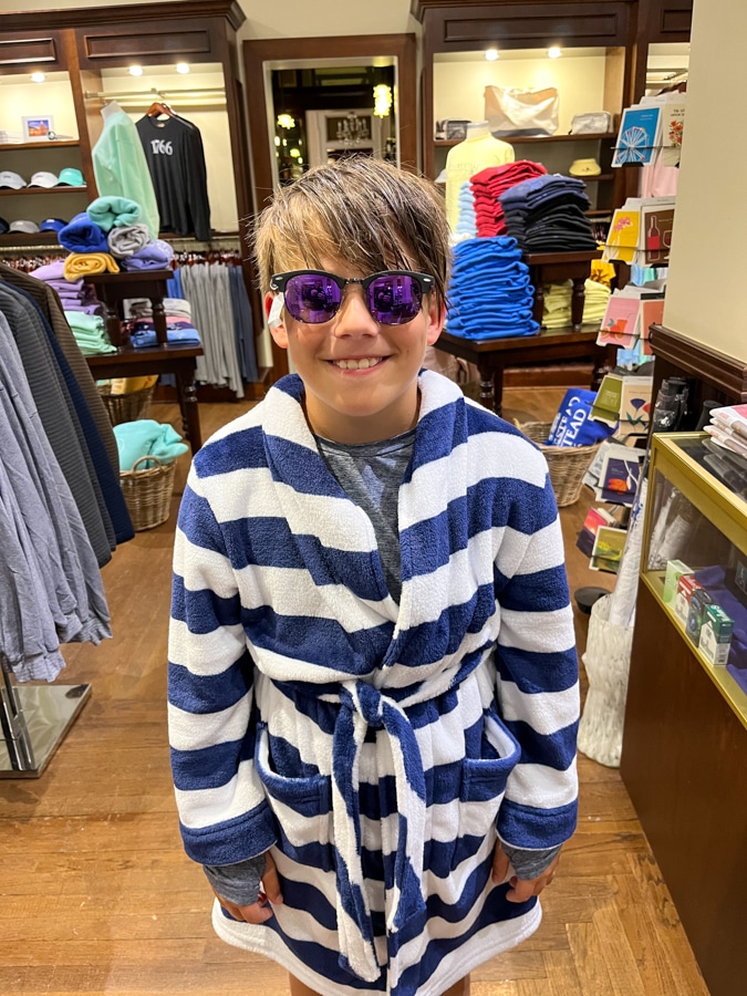 little boy in striped robe and shades little boy in striped robe and shades