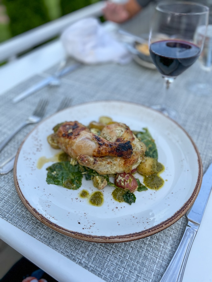 herby chicken plate herby chicken with kale, goat cheese, and chimichurri potatoes