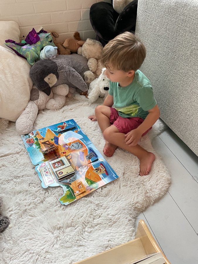 Little boy surrounded by stuffed toys Little boy surrounded by stuffed toys