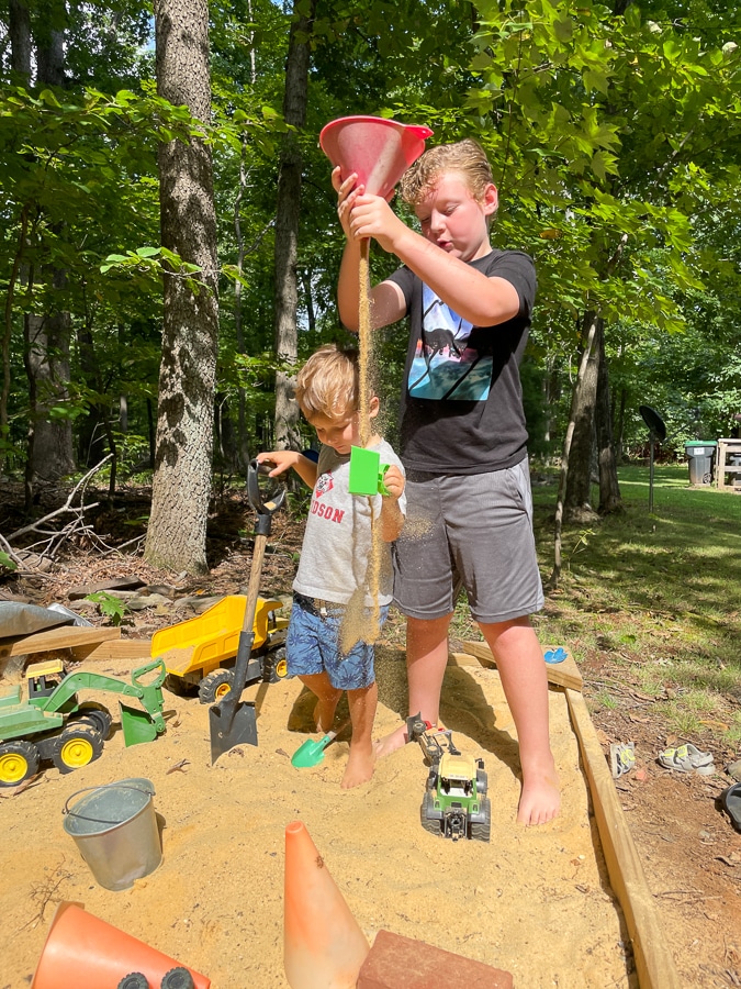 kids playing in sandbox | North Gardening