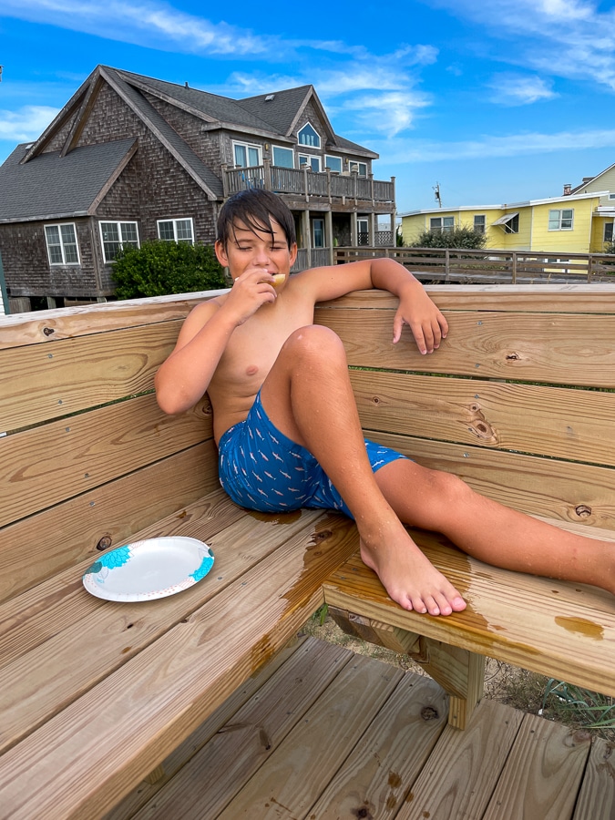 boy lounging by the hot tub boy lounging by the hot tub | Fall Trip To OBX