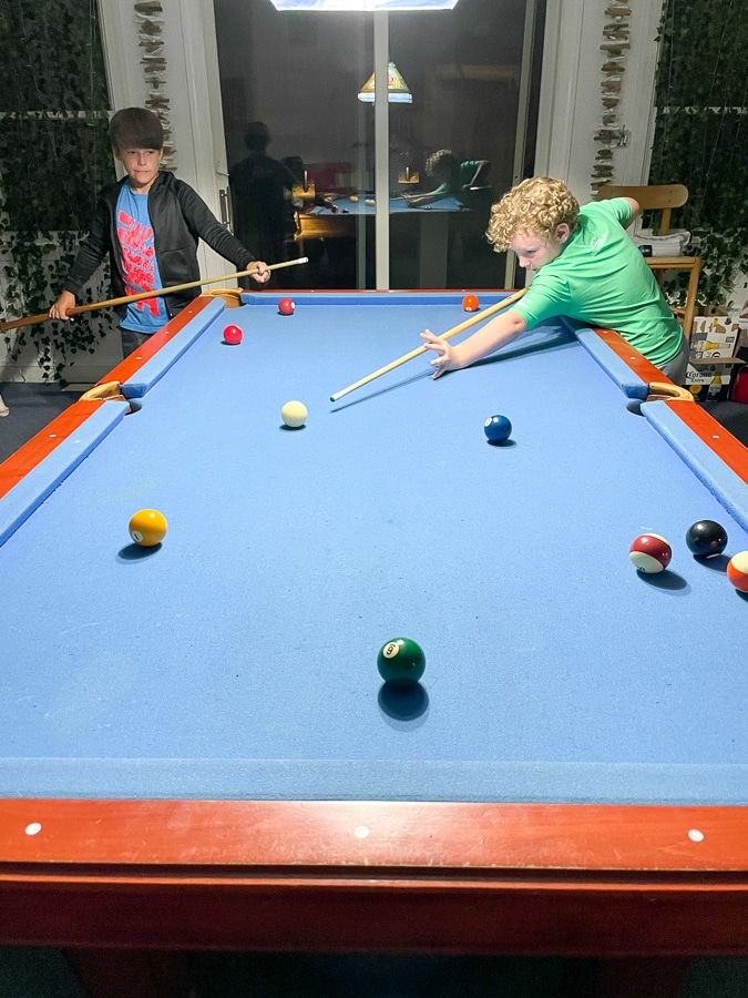 little boys playing pool