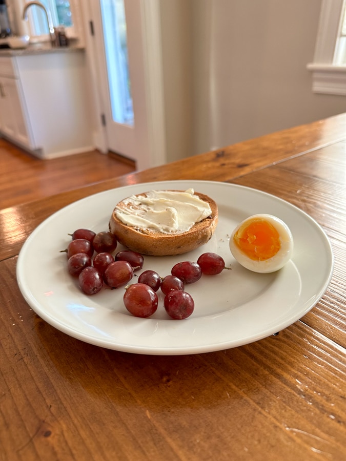 egg grapes bagel hard-boiled egg, grapes, and bagel
