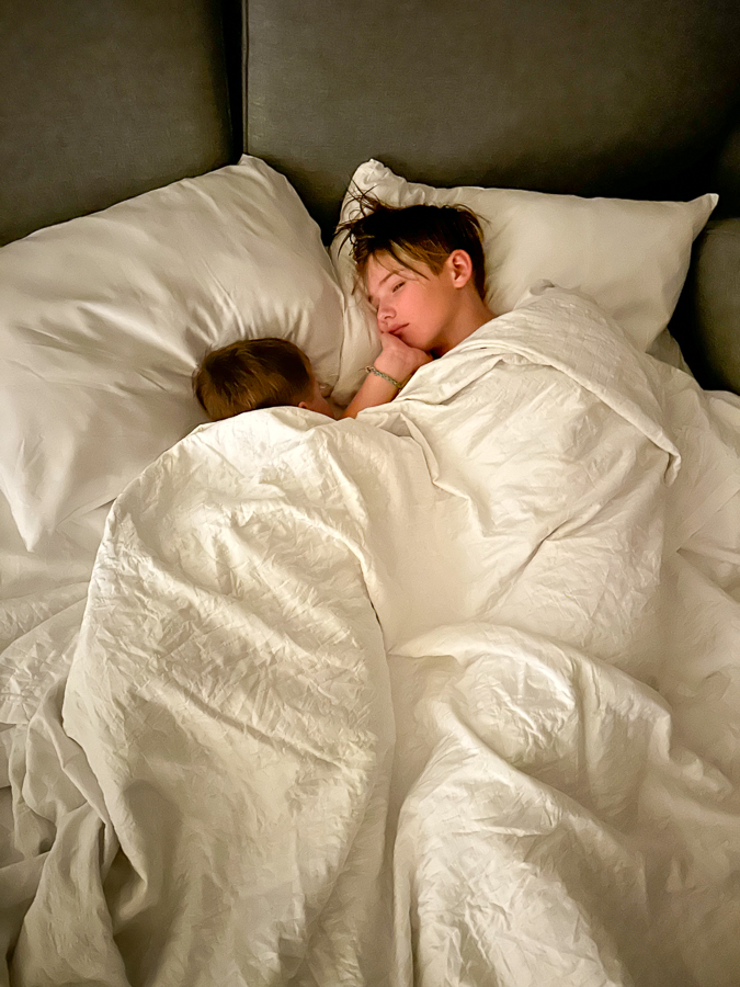 Brothers at hotel bed Brothers at hotel bed