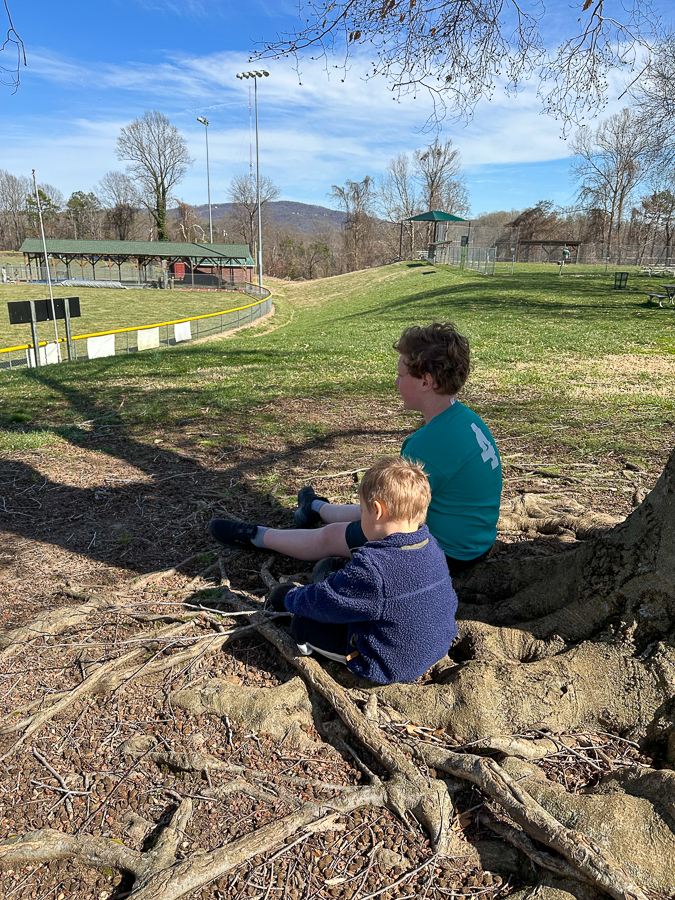 birch and cousin Nashie Watching baseball practice with cousin Nashie