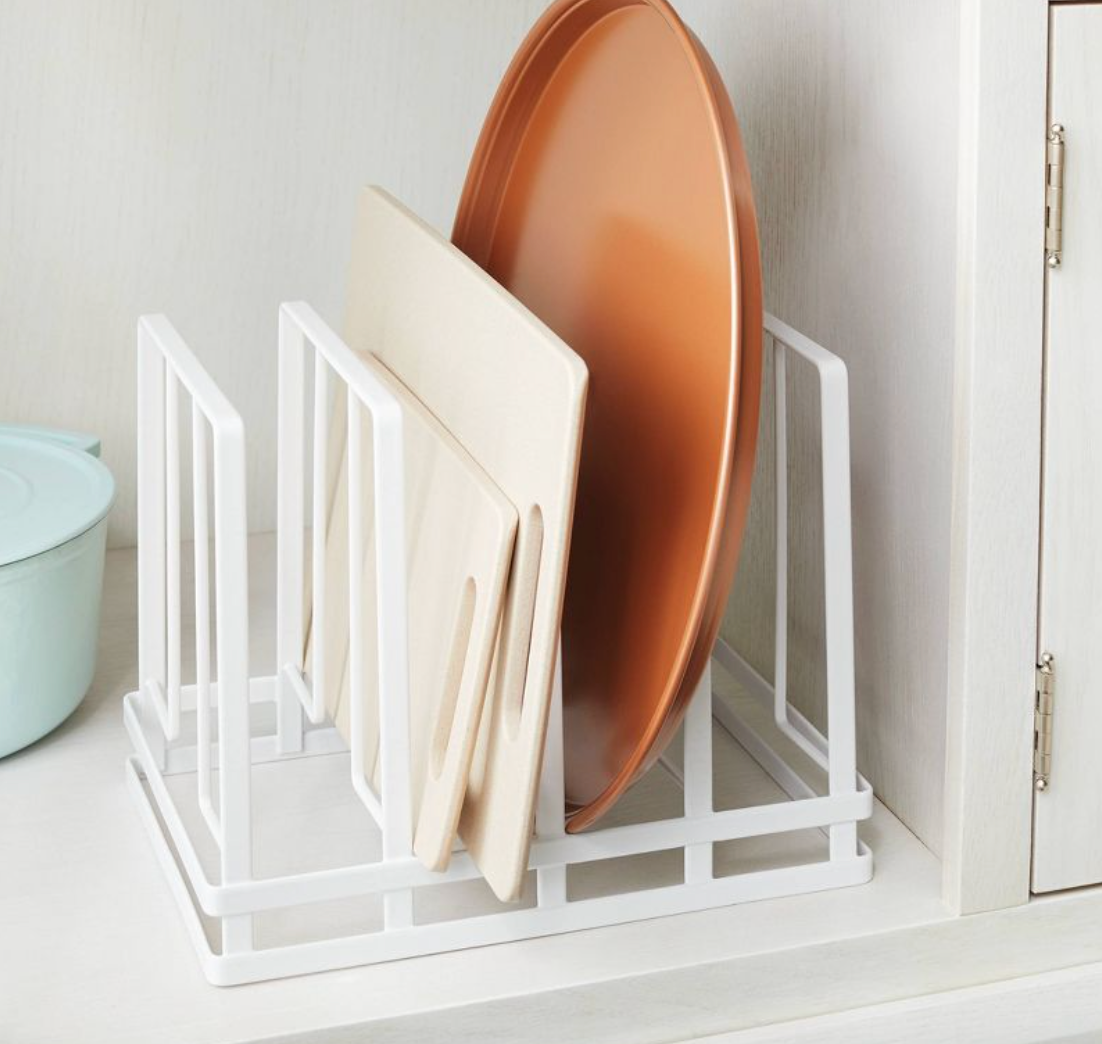 Vertical storage for cutting boards Vertical storage for sheet pans and cutting boards