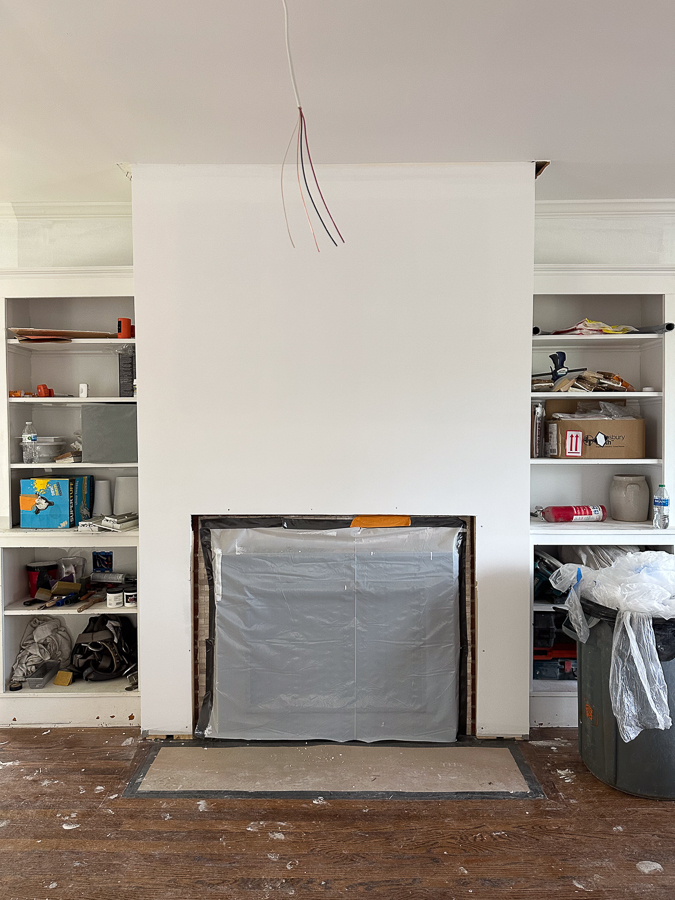 fireplace with drywall House Update: Hanging The Drywall