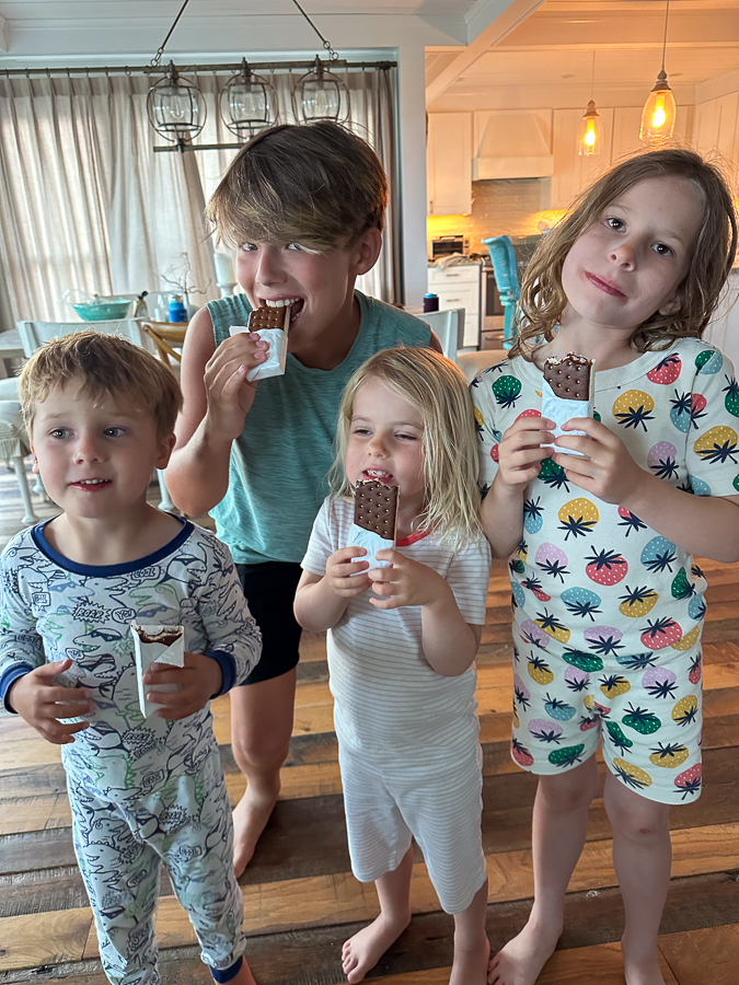 cousins eating ice cream sandwich cousins eating ice cream sandwich