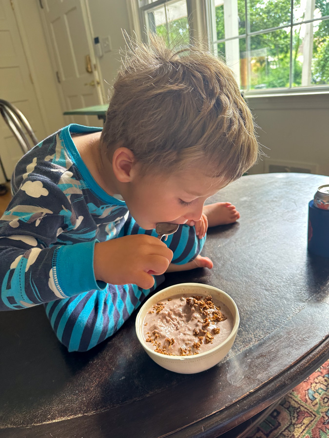 boy eating smoothie bowl