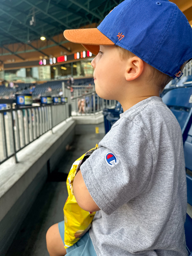 kid watching Durham Bulls game