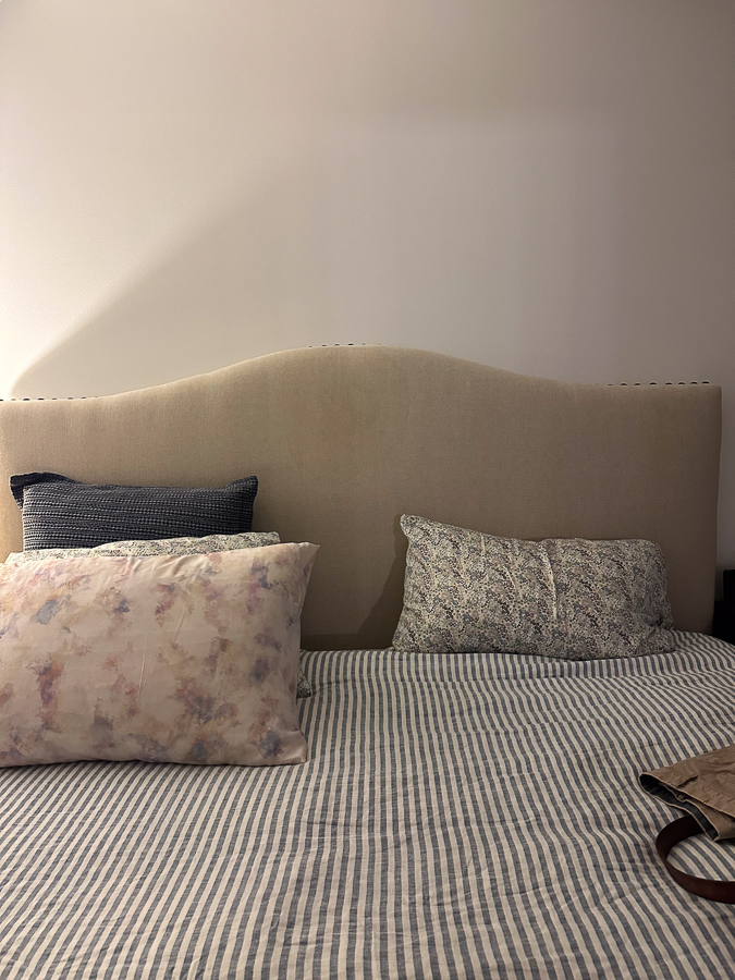 bed headboard with light stain