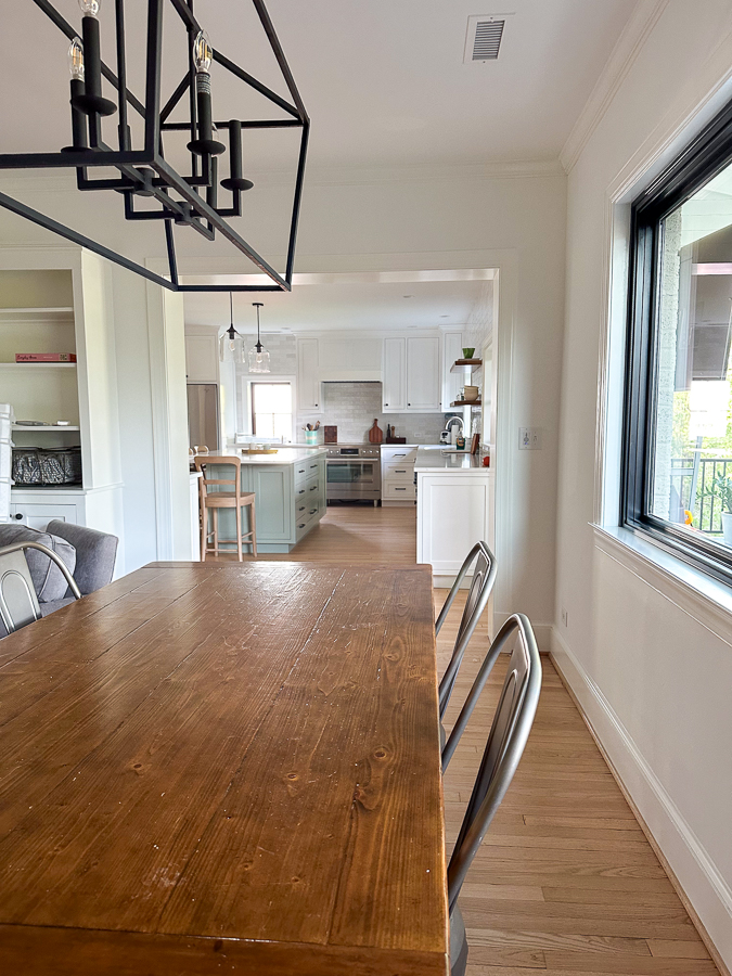 dining table with kitchen view