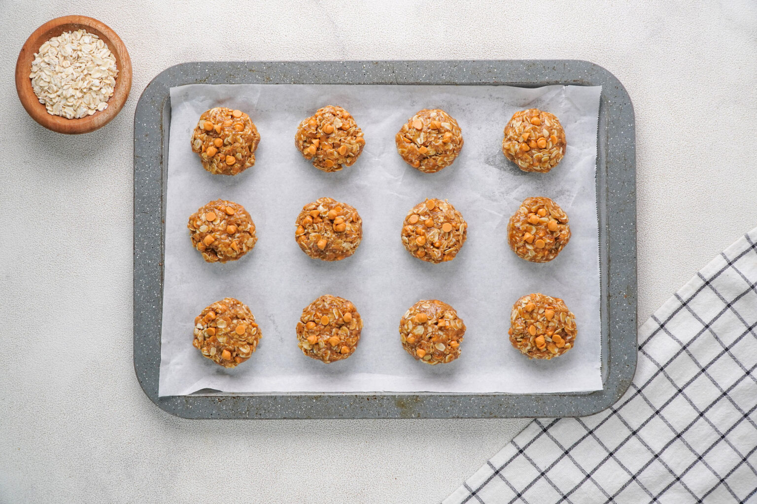 Portion cookie dough on baking sheet Portion cookie dough on baking sheet