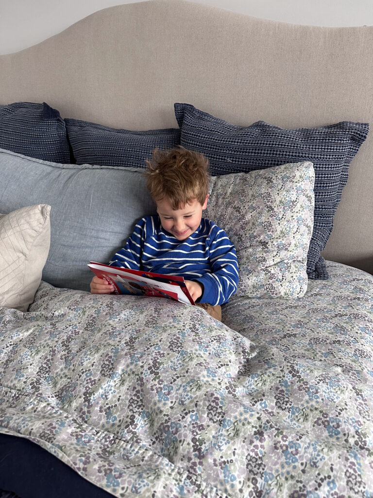 reading on parents' bed reading on parents' bed