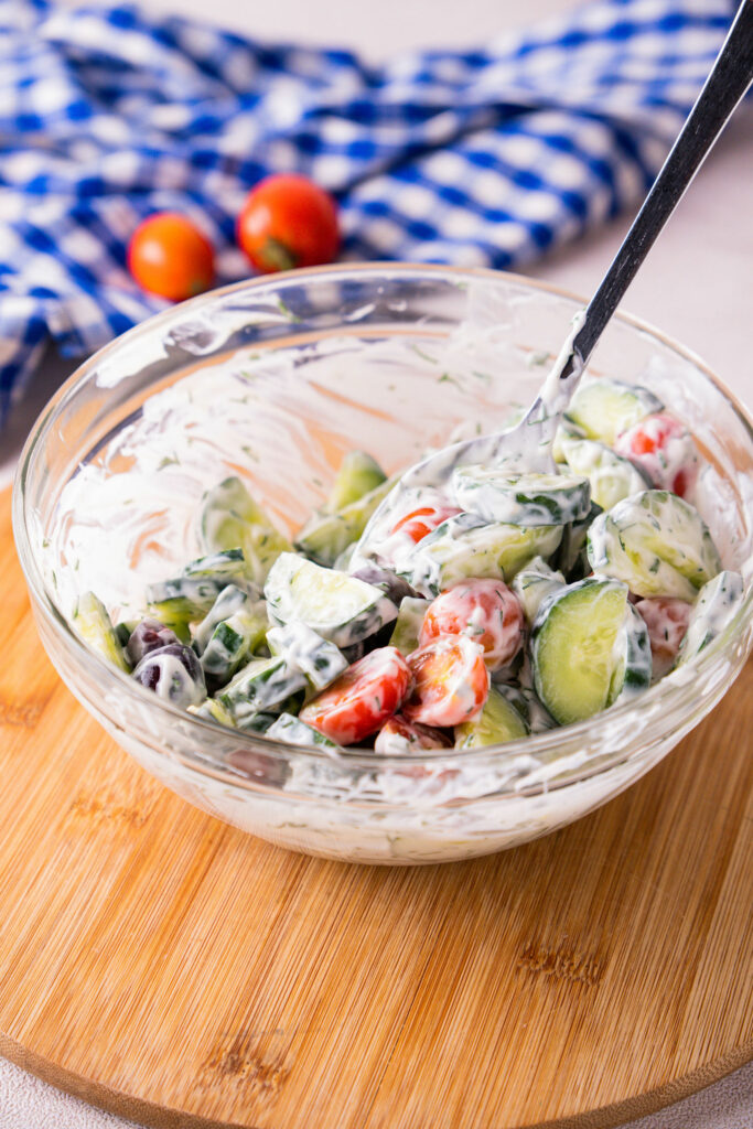 Mix salad ingredients and dressing