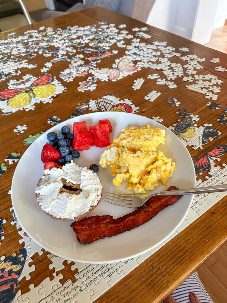 Kath Eats Blogger Kath Younger shares their Virginia Theater Festival + KERF Vacay - in photo: puzzles on a table and a plate with food Kath Eats Blogger Kath Younger shares their Virginia Theater Festival + KERF Vacay - in photo: puzzles on a table and a plate with food