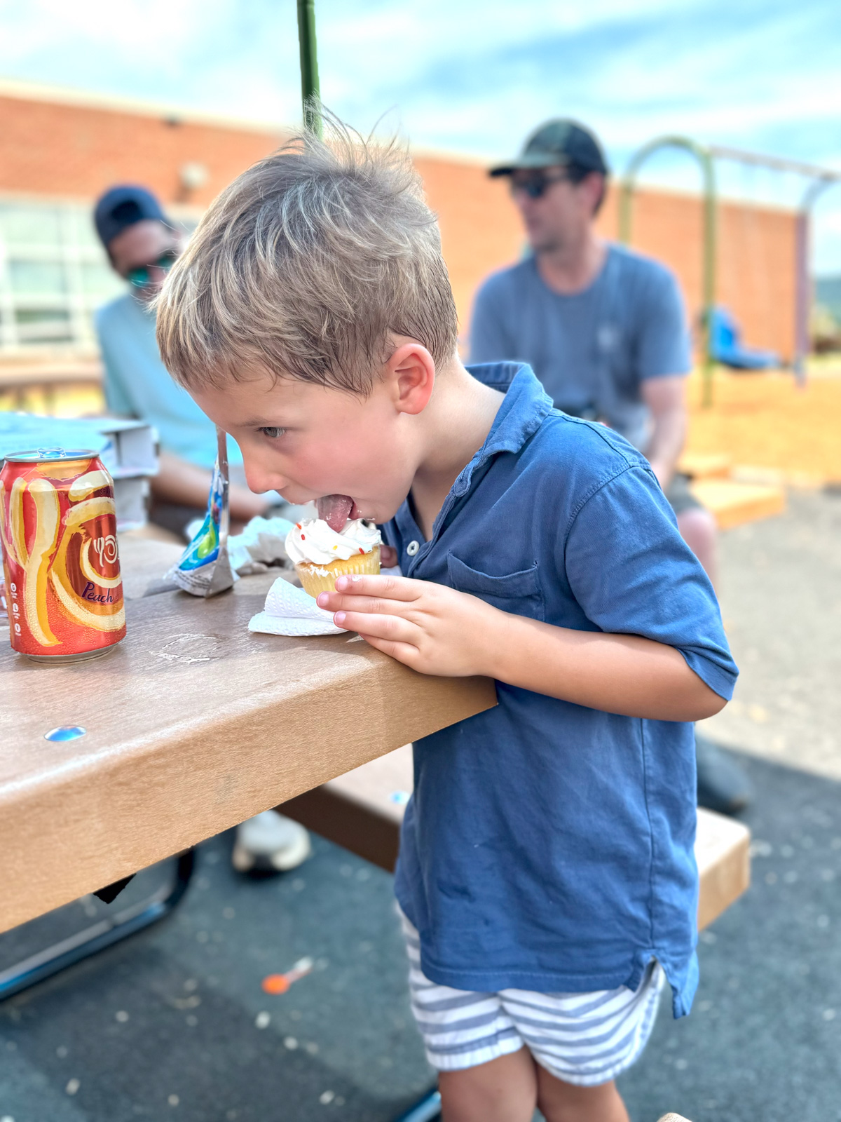 Kath Eats Blogger Kath Younger shares Summerween photos - kid eating ice cream at a birthday party