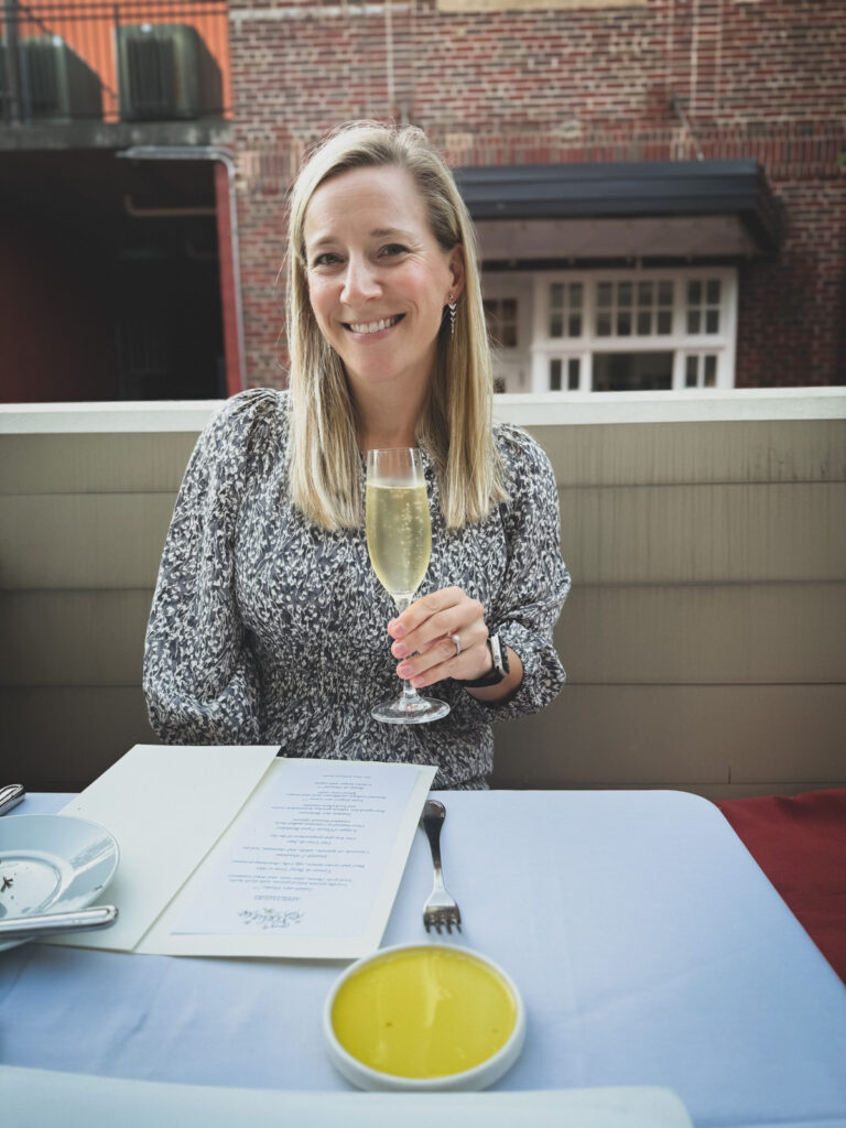 Kath Eats Blogger Kath Younger shares her October - in photo: Kath holding a glass of white wine Kath Eats Blogger Kath Younger shares her October - in photo: Kath holding a glass of white wine
