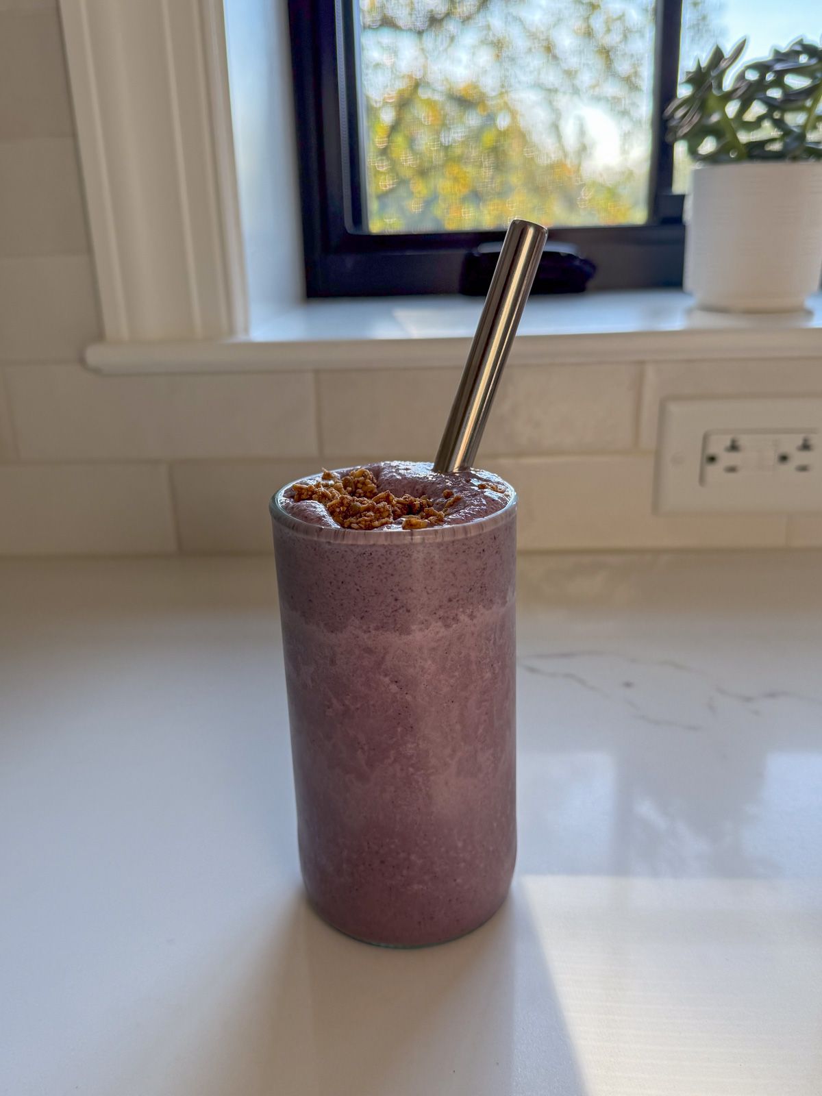 superfood smoothie glass superfood smoothie in clear glass with stainless steel straw