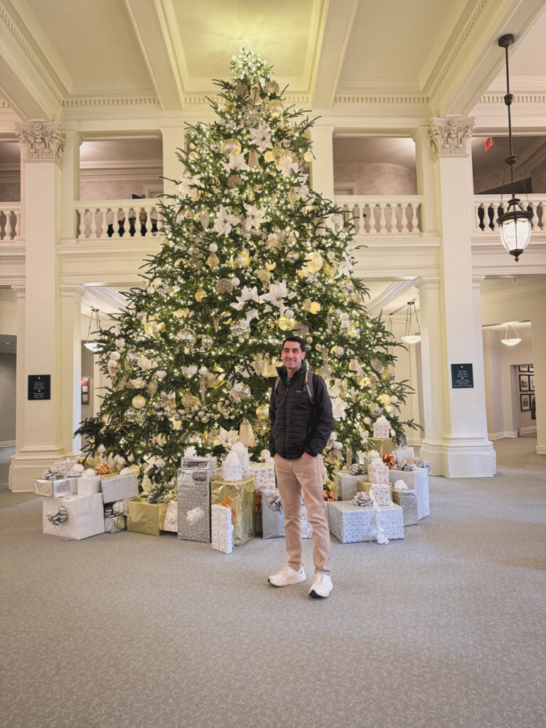 Kath EatsBlogger Kath Younger shares Homestead Holiday - photo of a man near the Christmas tree Kath EatsBlogger Kath Younger shares Homestead Holiday - photo of a man near the Christmas tree
