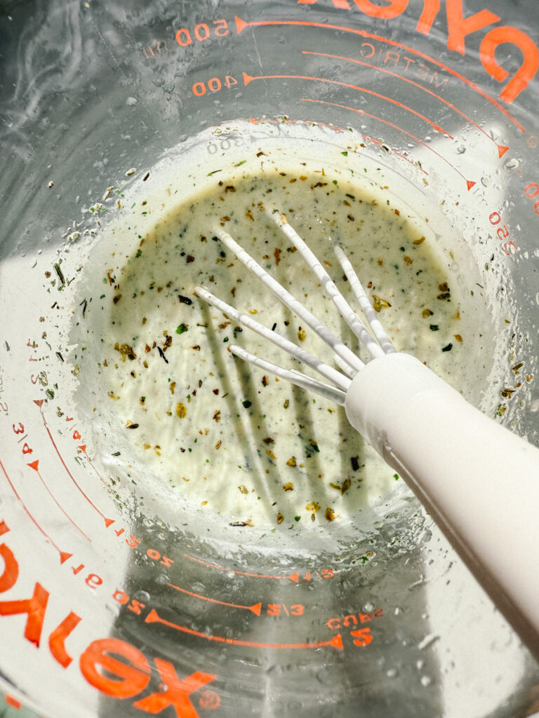 Combine yogurt, lemon juice, mustard, olive oil, Italian seasoning and salt and pepper