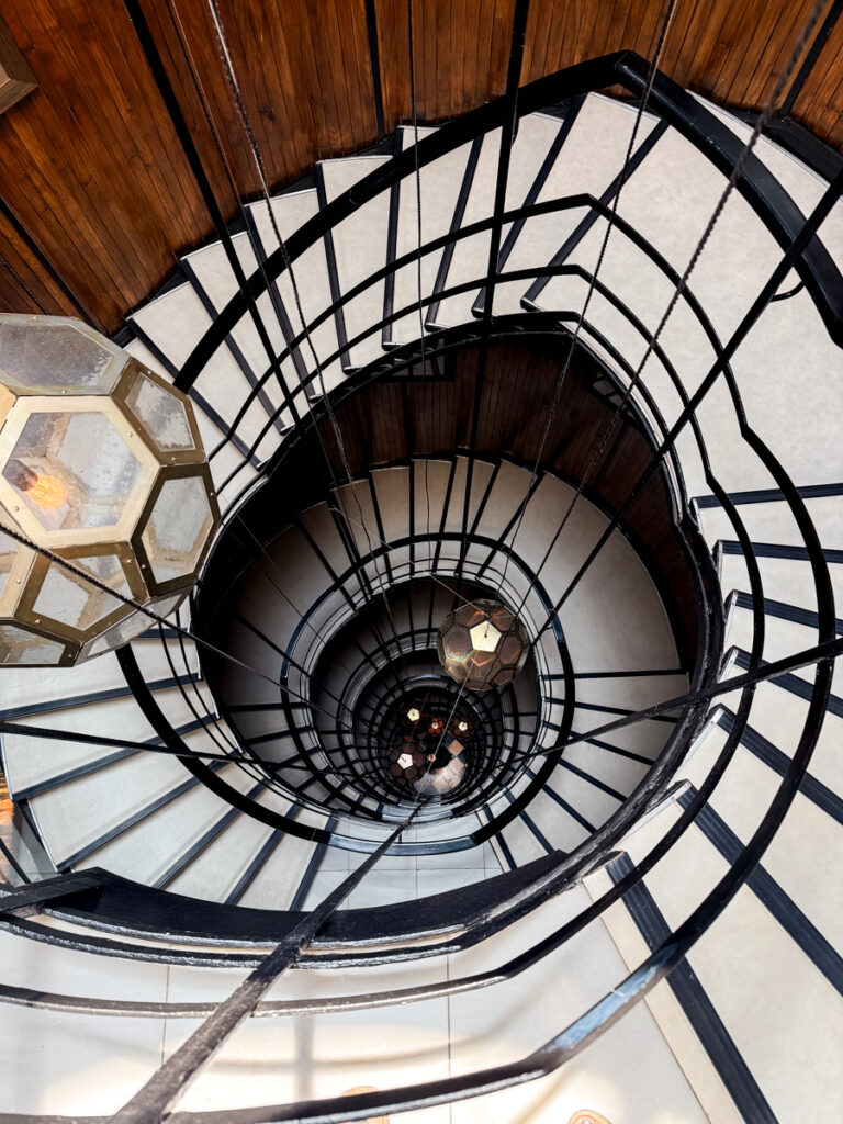 Cotton House Hotel bookshelf Cotton House Hotel stairs